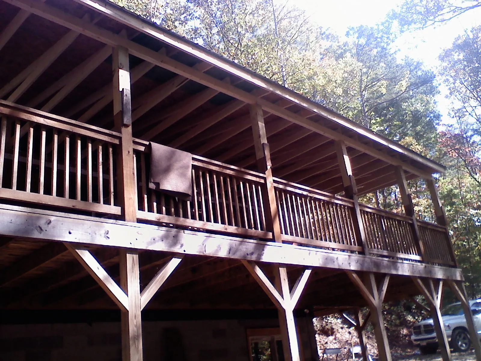 Timber framing under a new elevated porch and deck in Lidgerwood